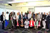 a group of people posing for a photo