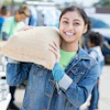 a woman holding a burlap bag