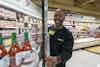 a man standing in a grocery store