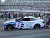NASCAR driver Denny Hamlin’s #11 racecar, wrapped with R4R branding, at the NASCAR Coke Zero Sugar 400 at the Daytona Beach Raceway.