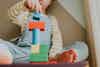 a child playing with blocks