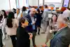 a group of people standing in a room