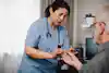 a doctor giving a patient a blood test