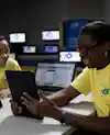 a woman looking at a tablet
