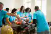 a group of people in blue shirts