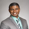 Former U.S. Marine LaGarian Smith was hired after participating in a 12-week corporate fellowship program led by HOH. Photo credit: LaGarian Smith