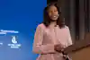 a woman standing at a podium
