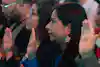 a group of people clapping