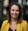 a woman smiling at camera